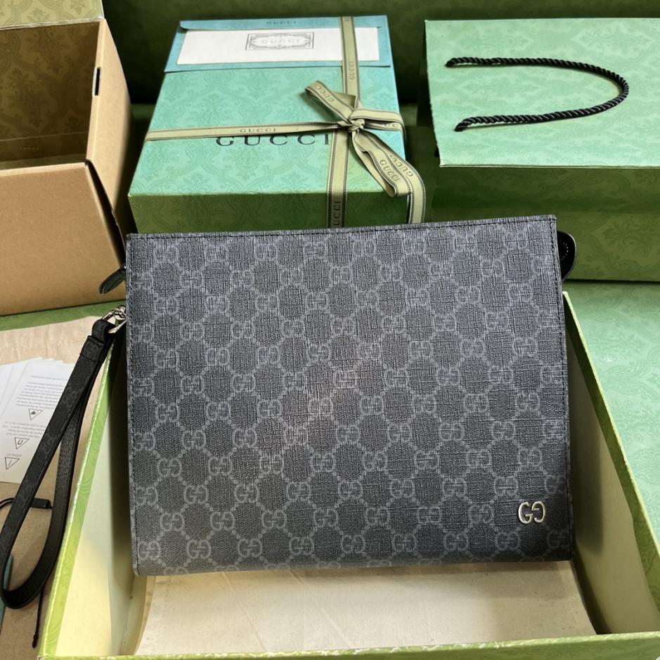 Pochette GG “Con set completo di confezione originale in scatola verde”.