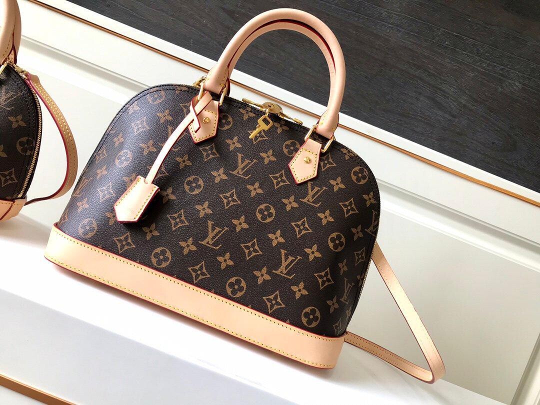 LV Alma PM in Tela Monogram