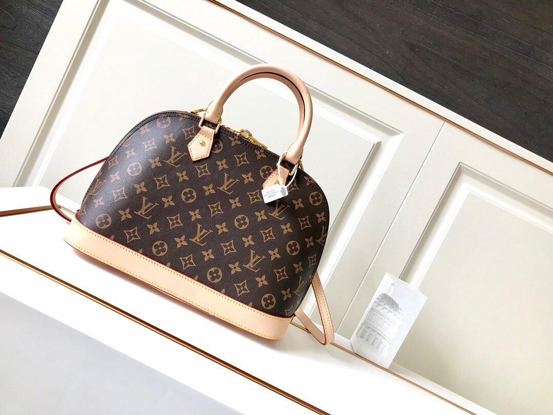 LV Alma PM in Tela Monogram