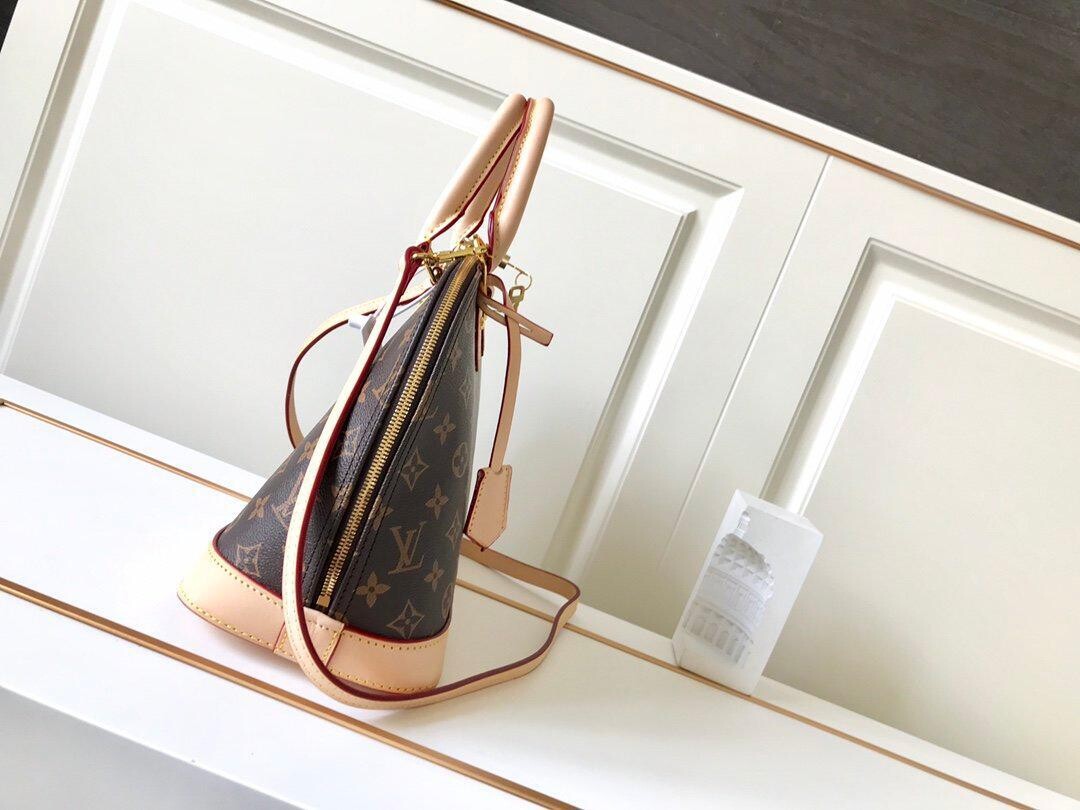 LV Alma PM in Tela Monogram